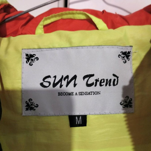 Sleeveless jacket used, size medium, yellow