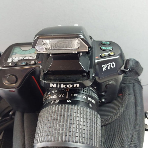 Nikon F70 used with 28-80 lens and case