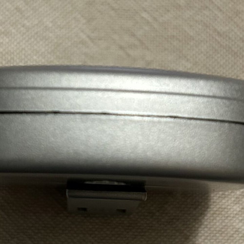 Pocket Radio with Headphones like new, silver color