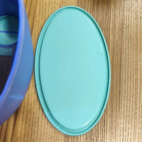 Tupperware storage container 1.6 L like new, purple with green lid