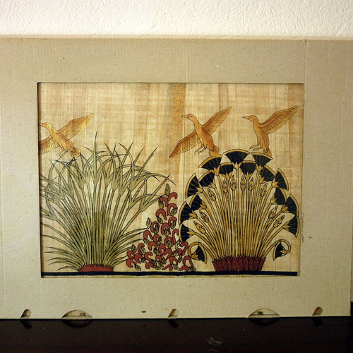 Egyptian papyrus with painting in glass frame
