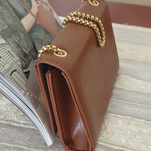 Shoulder bag like new with gold chain brown color