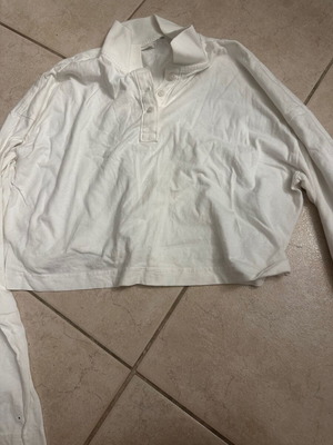 White blouses used, sizes M and L, one with small stain