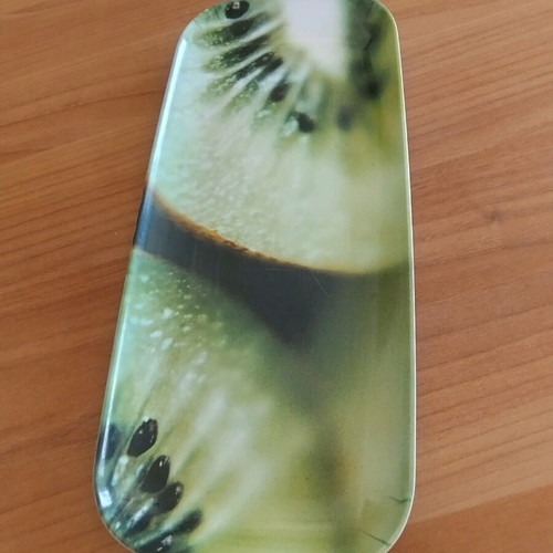 Serving platter elongated with kiwi background used, light signs of wear