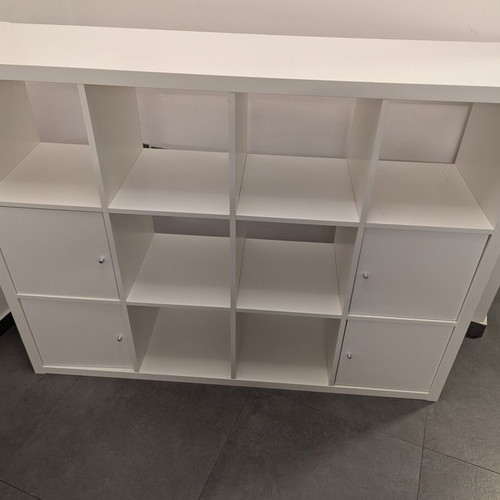 IKEA Kallax white shelving unit with 4 inserts