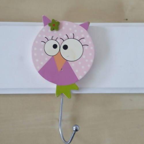 Wooden children's wall clothes hanger with three owl figures used