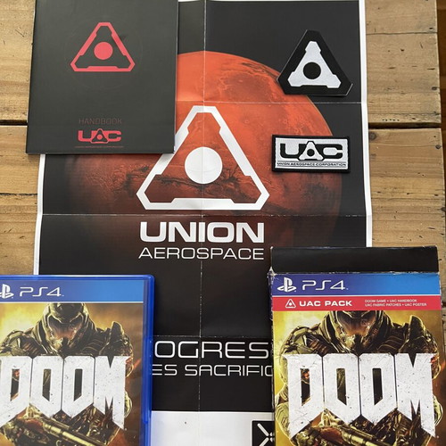 Doom PS4 deluxe edition with UAC pack, like new