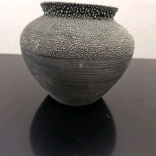 Ceramic vase low in gray shades like new
