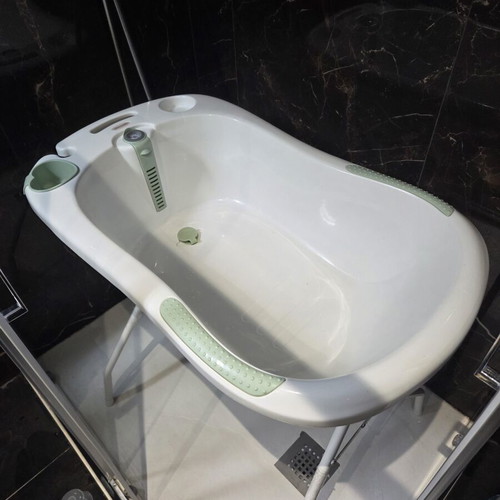 Baby bath with seat, thermometer and stand