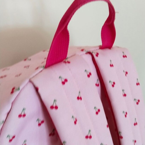 School bag used, pink with cherry and polka dot pattern