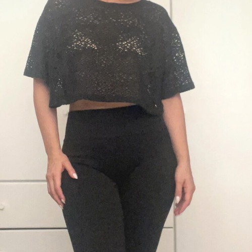 Black perforated blouse like new, medium size, loose fit