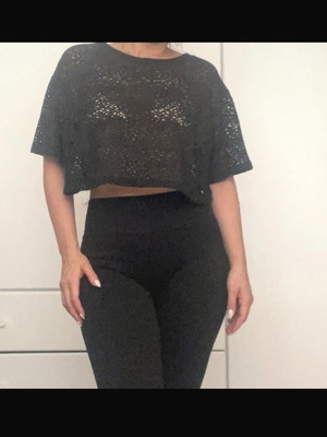 Black perforated blouse like new, medium size, loose fit