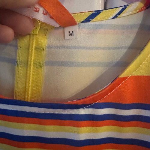 Dress medium like new with thick fabric and colorful stripes