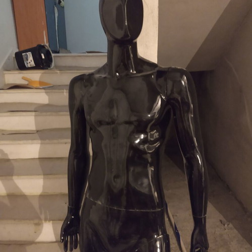 Mannequin used, glossy black male display doll