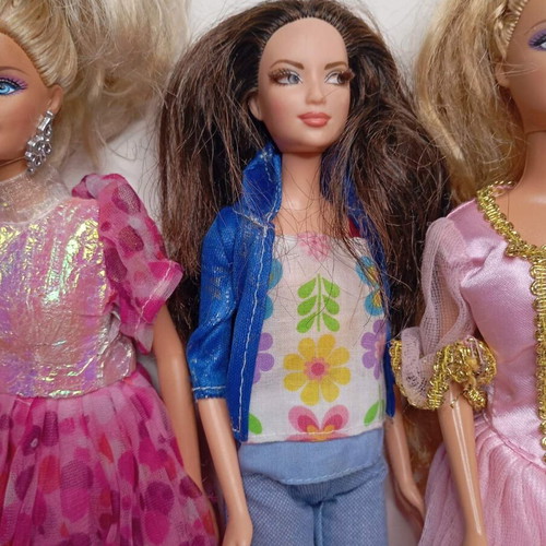 Barbie doll set of 3 used with clothes