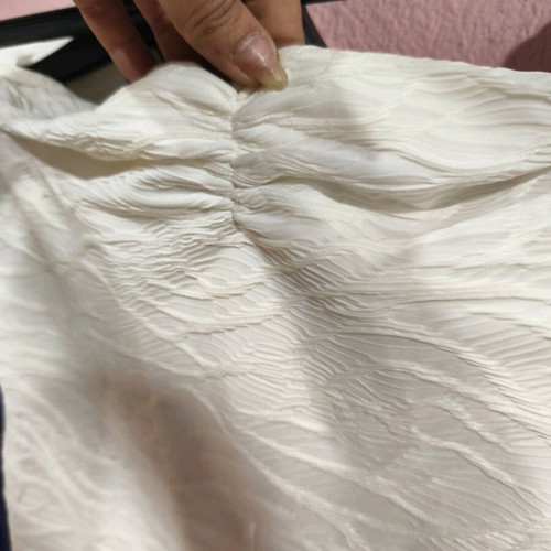 White all-in-one shorts with embossed designs Shein
