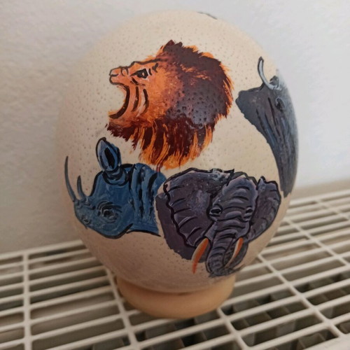 Ostrich egg painted like new with stand and painted animals