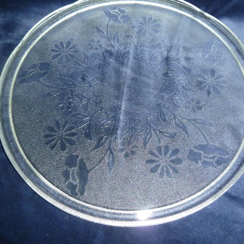 Glass serving platter used with embossed flower design, 32 cm