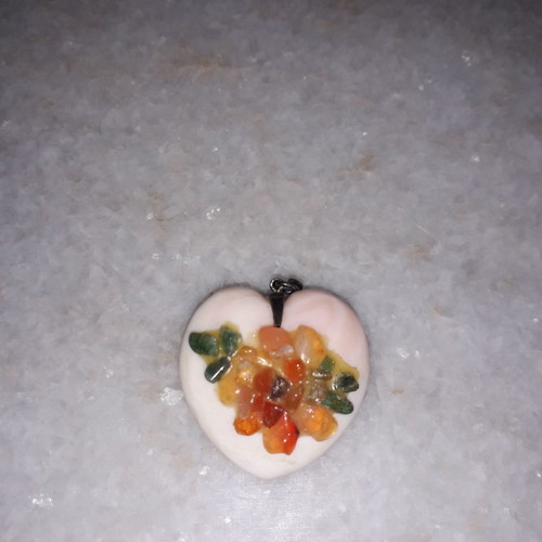 Coral heart pendant used with mosaic design