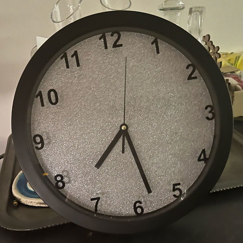 Wall clock with silver glitter background like new