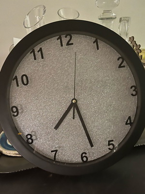 Wall clock with silver glitter background like new