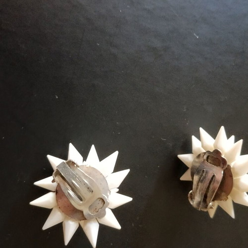 Vintage white clip-on earrings used from the 1960s