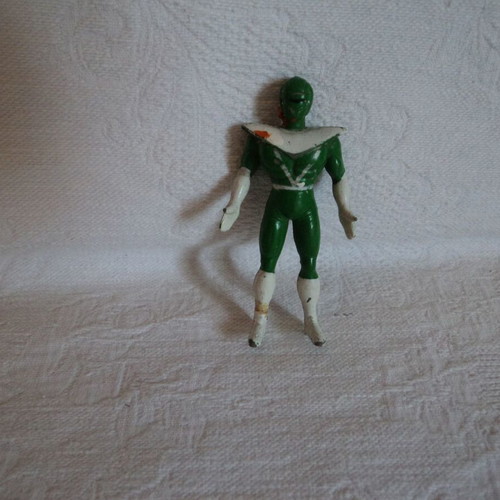 Small action figures used, approx. 8cm, including Power Rangers and Archaeopteryx