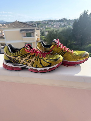 Asics Gel Nimbus 15 athletic shoes used, yellow