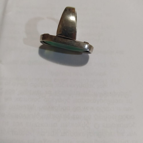 Silver ring with green stone like new