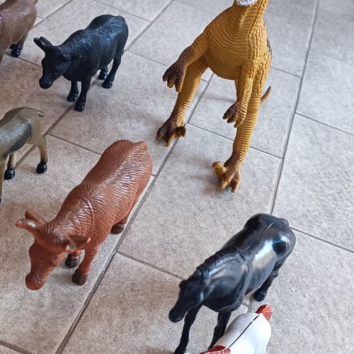 Lot of 12 assorted animal and dinosaur figures