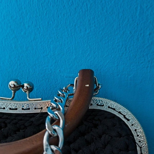 Handmade knitted shoulder bag used, black with wooden handle and chain