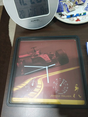 Johnny Walker wall clock used with small crack