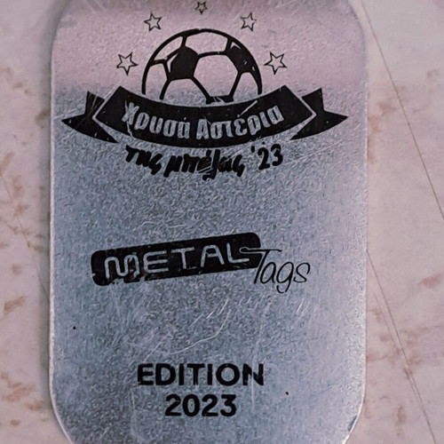 Two metal football cards