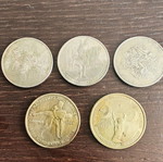 Sports-themed coins used, two 100 and three 500 drachmas