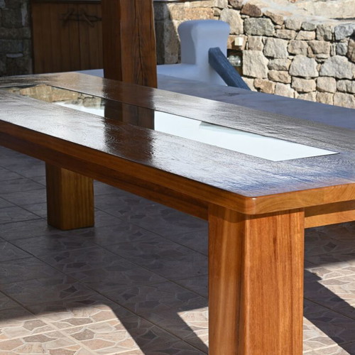 The Horizon outdoor dining table made of solid African Iroko, made to order