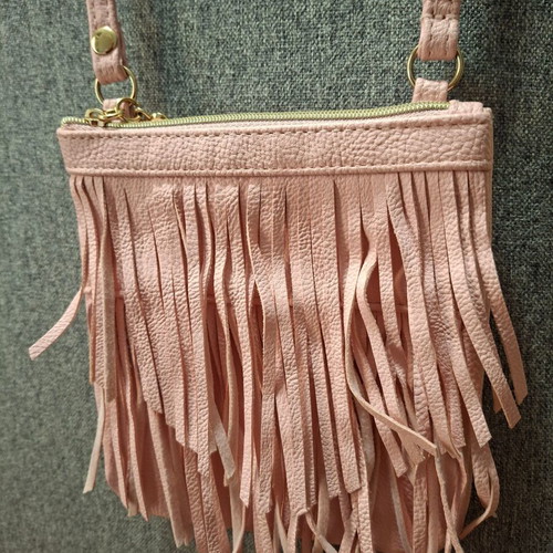 H&M pink crossbody bag for girls used with fringes and gold details