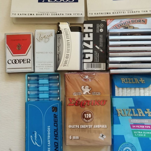 Vintage smoking collection with lighters, filters & rolling papers