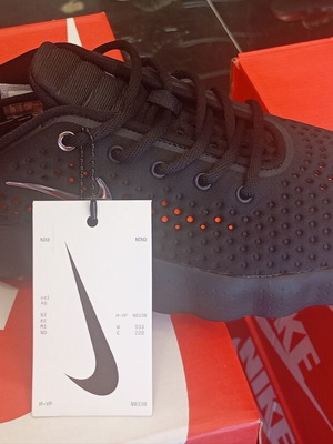 Nike Mind athletic shoes new, black and orange