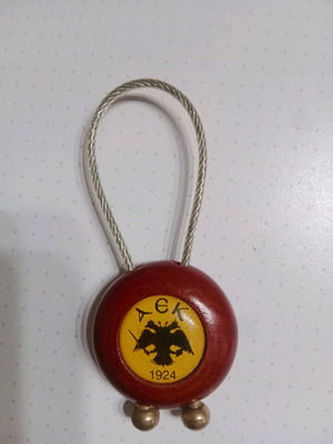 AEK single-sided keychain new in excellent condition
