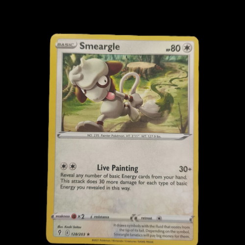 Pokemon trading card collection with Smeargle, Silvally, Pawniard, Zangoose, Lillipup, Metagross
