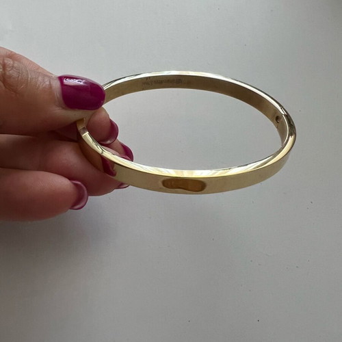 Steel cuff bracelet new, gold color