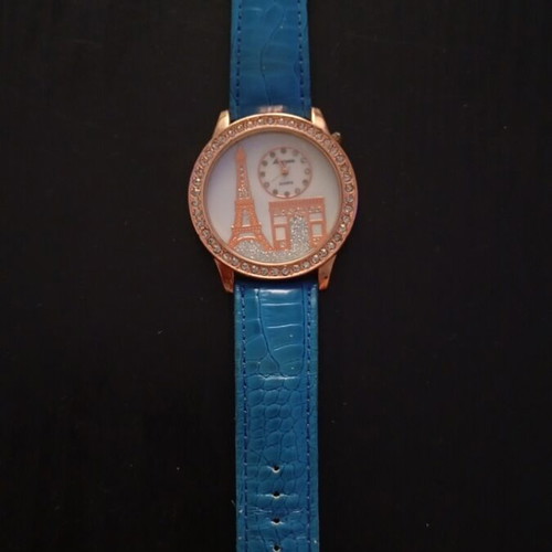 Women's wristwatch with rhinestones and blue straps used