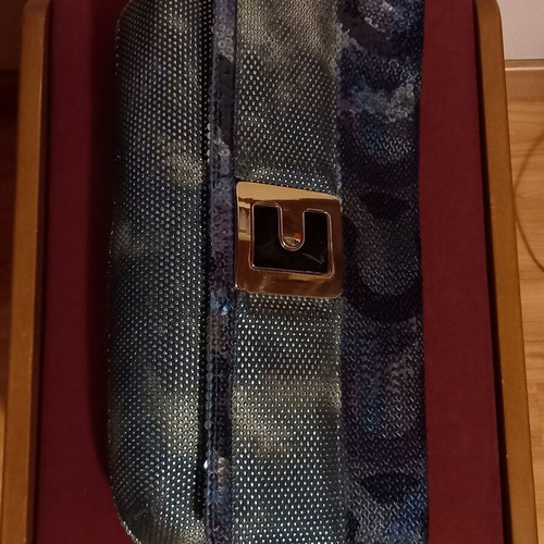 Clutch bag like new with blue and silver sequins