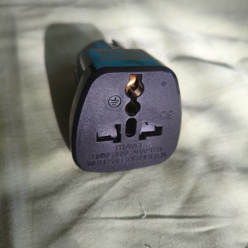 Universal travel adapter with safety cover, black