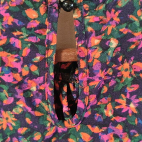 Women's blouse Medium like new, multicolor with elastic cuffs and button