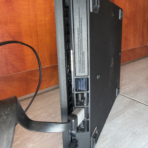PS4 Slim 1TB console used with 3 games and 1 controller