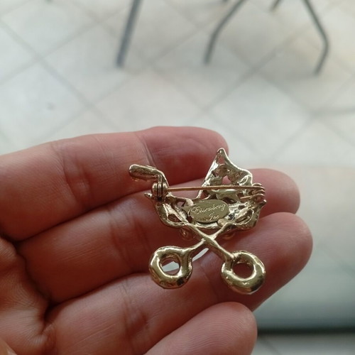 Eisenberg Ice vintage baby carriage brooch with Swarovski crystals
