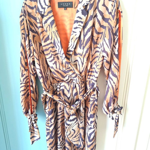 Lynne dress with animal print like new, size M