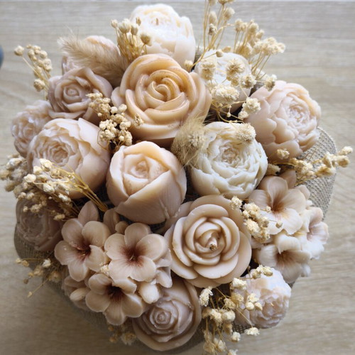 Scented bouquet of natural wax candle in pot