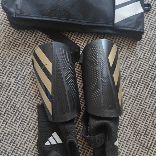 Adidas Tiro Junior Shinguards used with ankle support and case